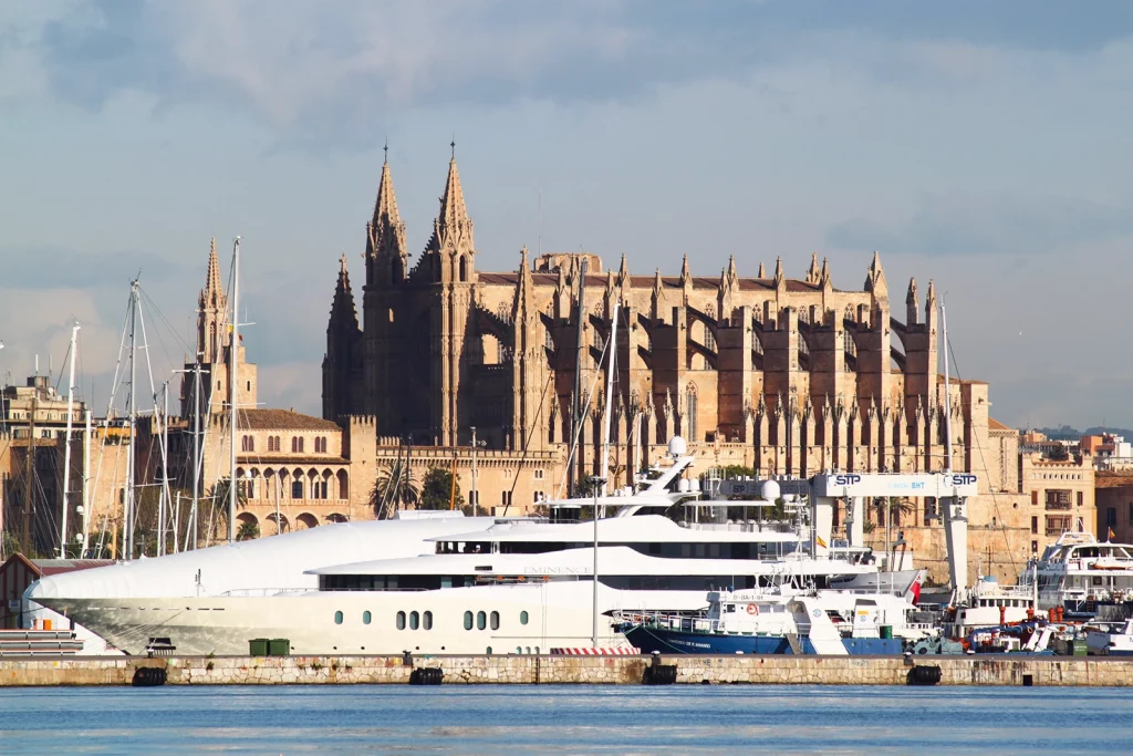 Balearic Islands guide to Palma de Mallorca cathedral and harbour in golden Mediterranean light