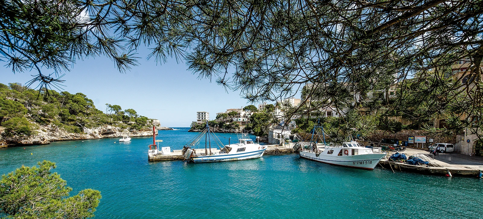 Cala Figuera Santanyí fishing harbour in Mallorca with boats and turquoise water