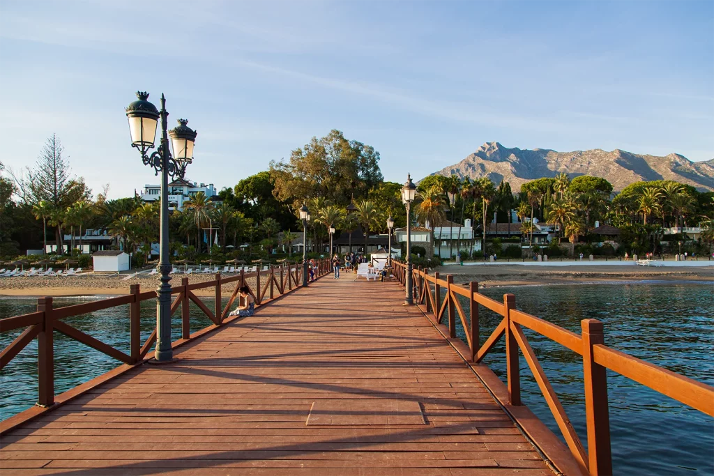 Marbella Club Hotel jetty on the Golden Mile with La Concha mountain