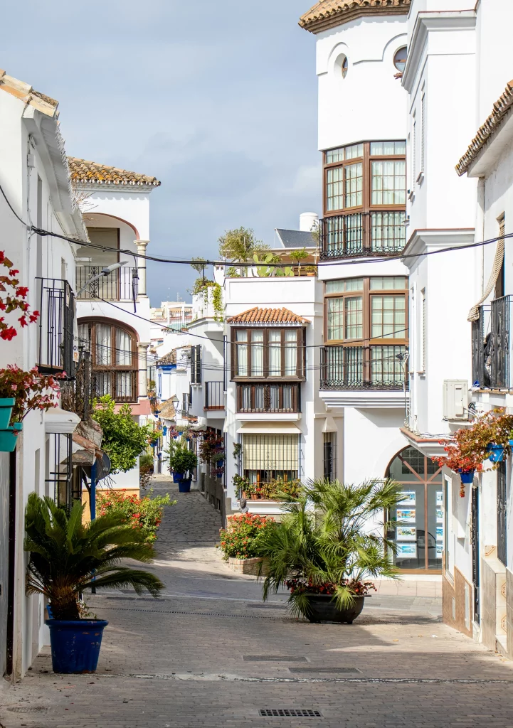 Whitewashed street in Estepona Old Town on Spain’s Costa del Sol.